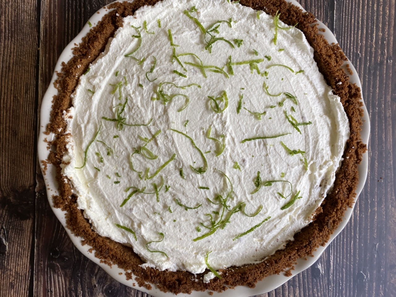 6615EC23 3E2A 4DD3 92AF 6F1B86FADF05 - Boozy Deep Dish Coconut Margarita Key Lime Pie with Tequila Blanco & Coconut Rum