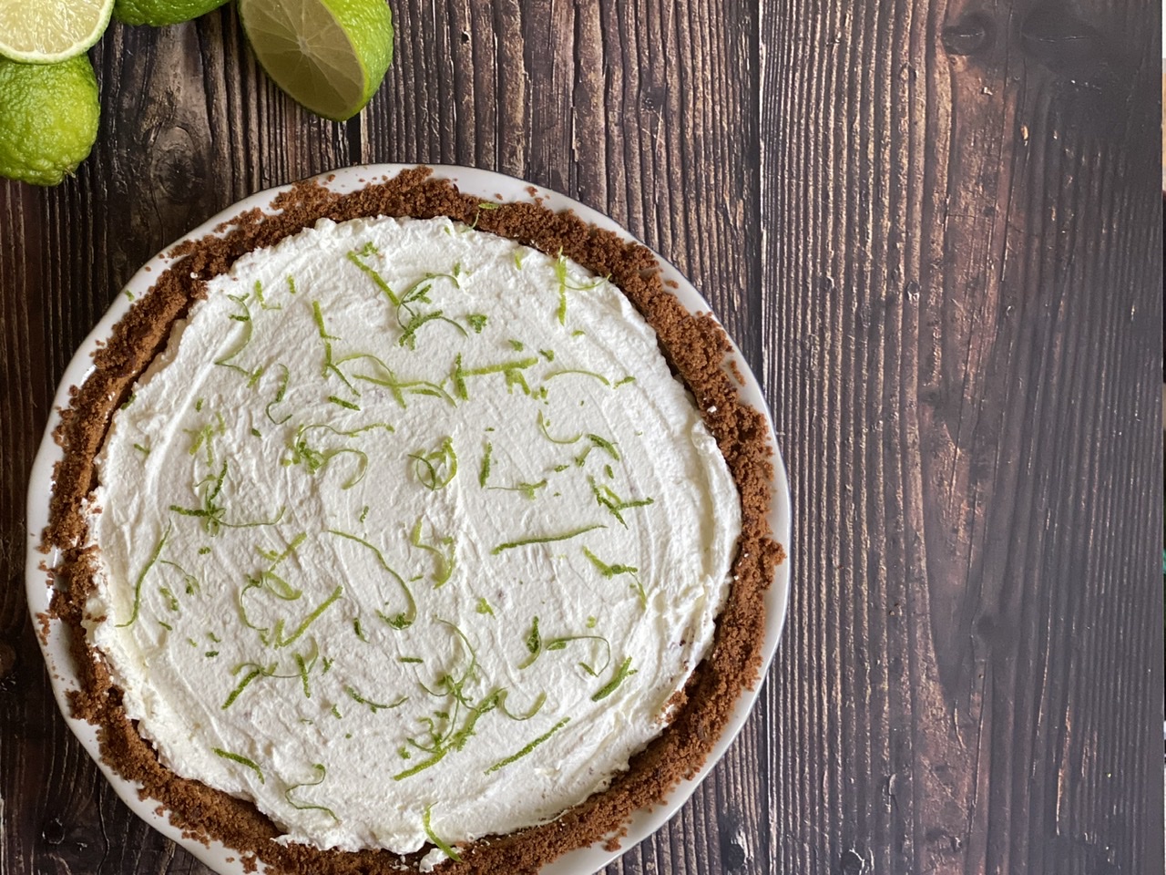 BB8534DE 7DFA 4697 A4F1 0A67F0C003E7 - Boozy Deep Dish Coconut Margarita Key Lime Pie with Tequila Blanco & Coconut Rum