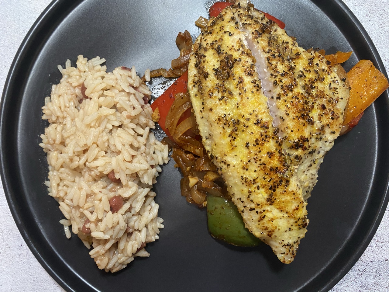 4BFA11D2 DFDD 41EC 825D 2173E287C7D7 - Cajun Catfish with Sautéed Onions & Peppers with Red Beans & Rice