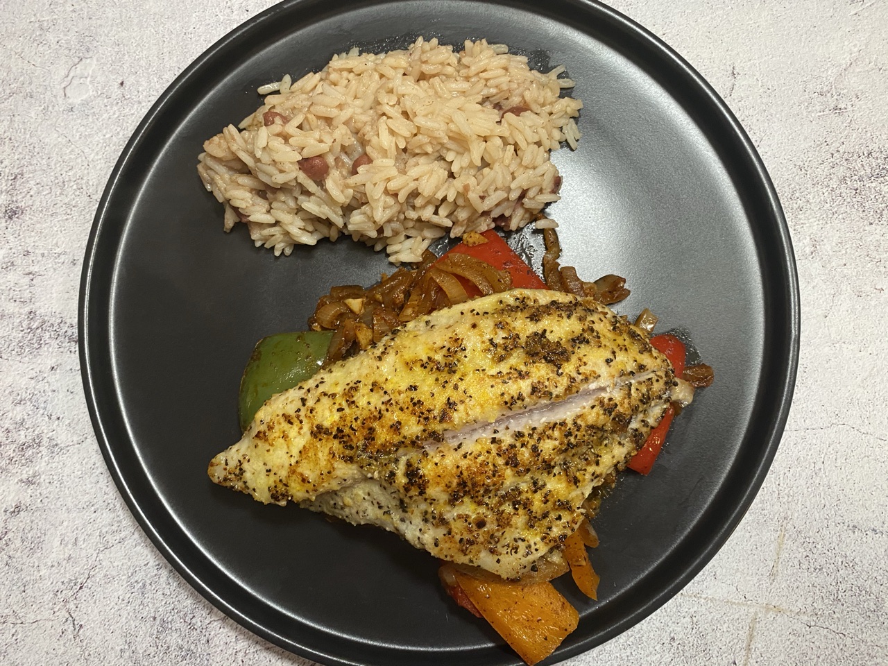 76A4D7B8 69BC 4E9E A44E 0BD1936FB6C1 - Cajun Catfish with Sautéed Onions & Peppers with Red Beans & Rice