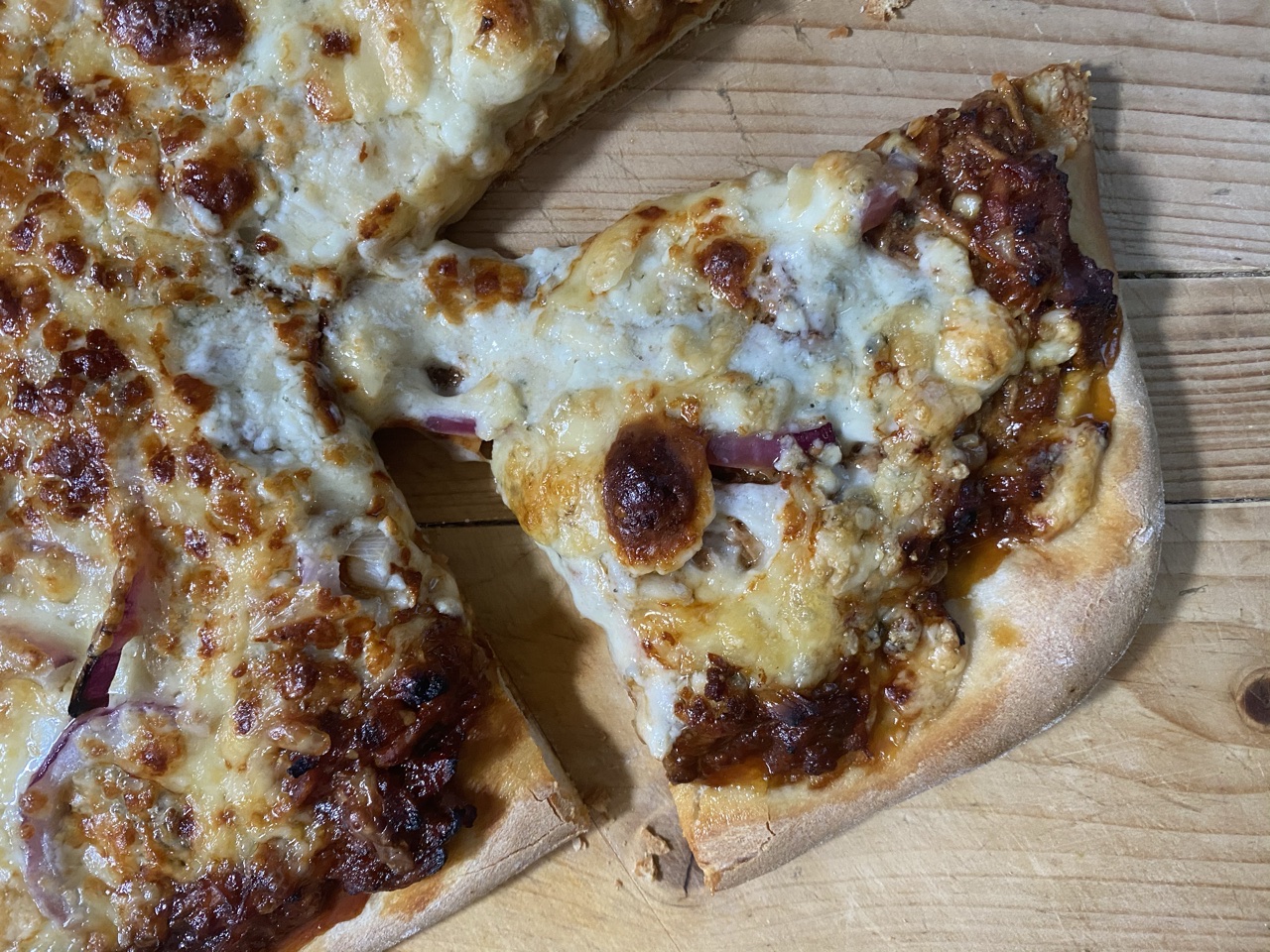 B170BFF5 E28F 4D85 AB43 5BF20E8C0331 - BBQ Chicken Pizza with Red Onions, Gorgonzola, & Smoked Gouda