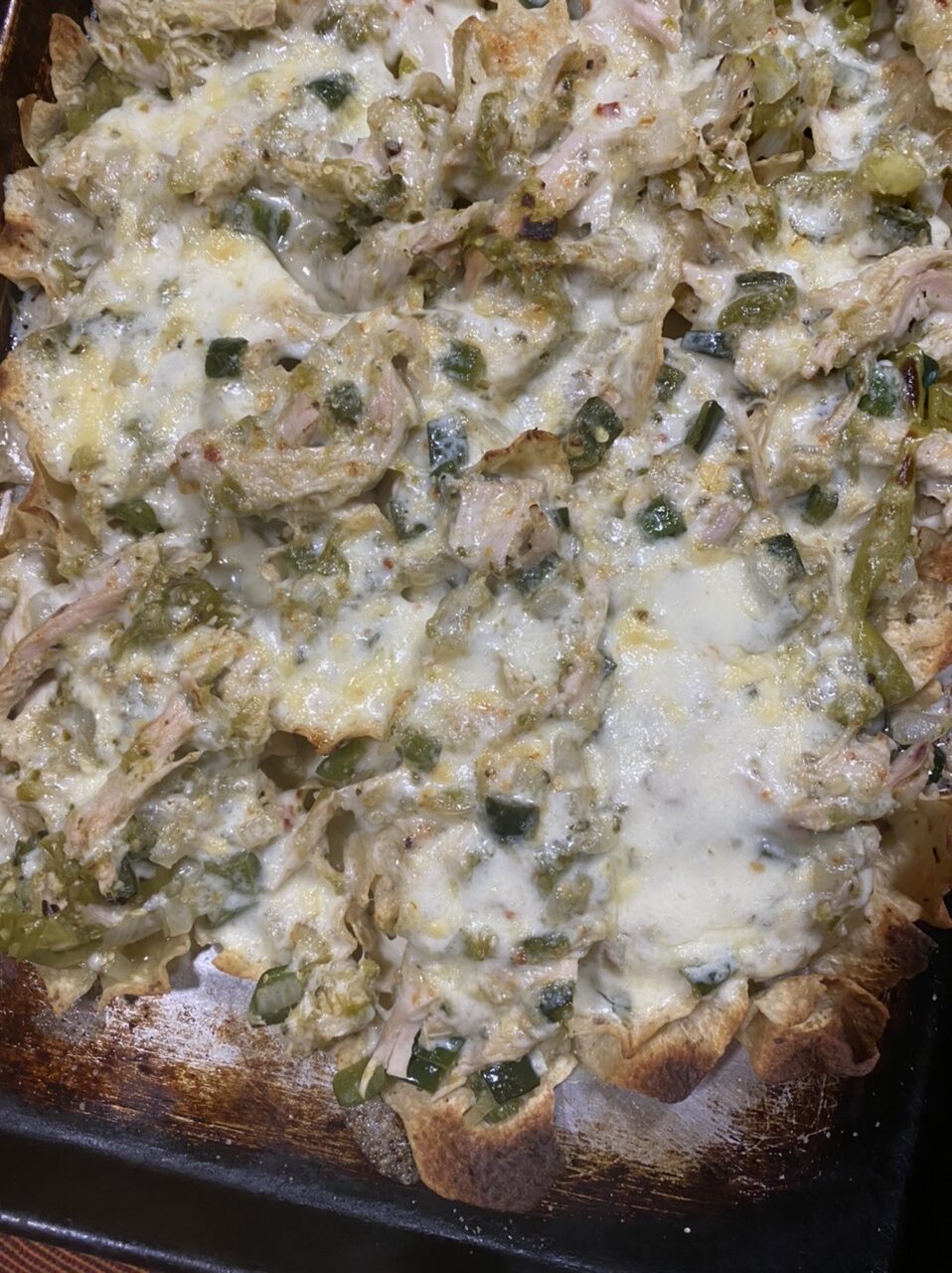 FDCD4080 66C4 4EE9 94E4 78909694B7D5 e1605125829525 - Leftover Turkey Cheesy Green Enchilada Nachos