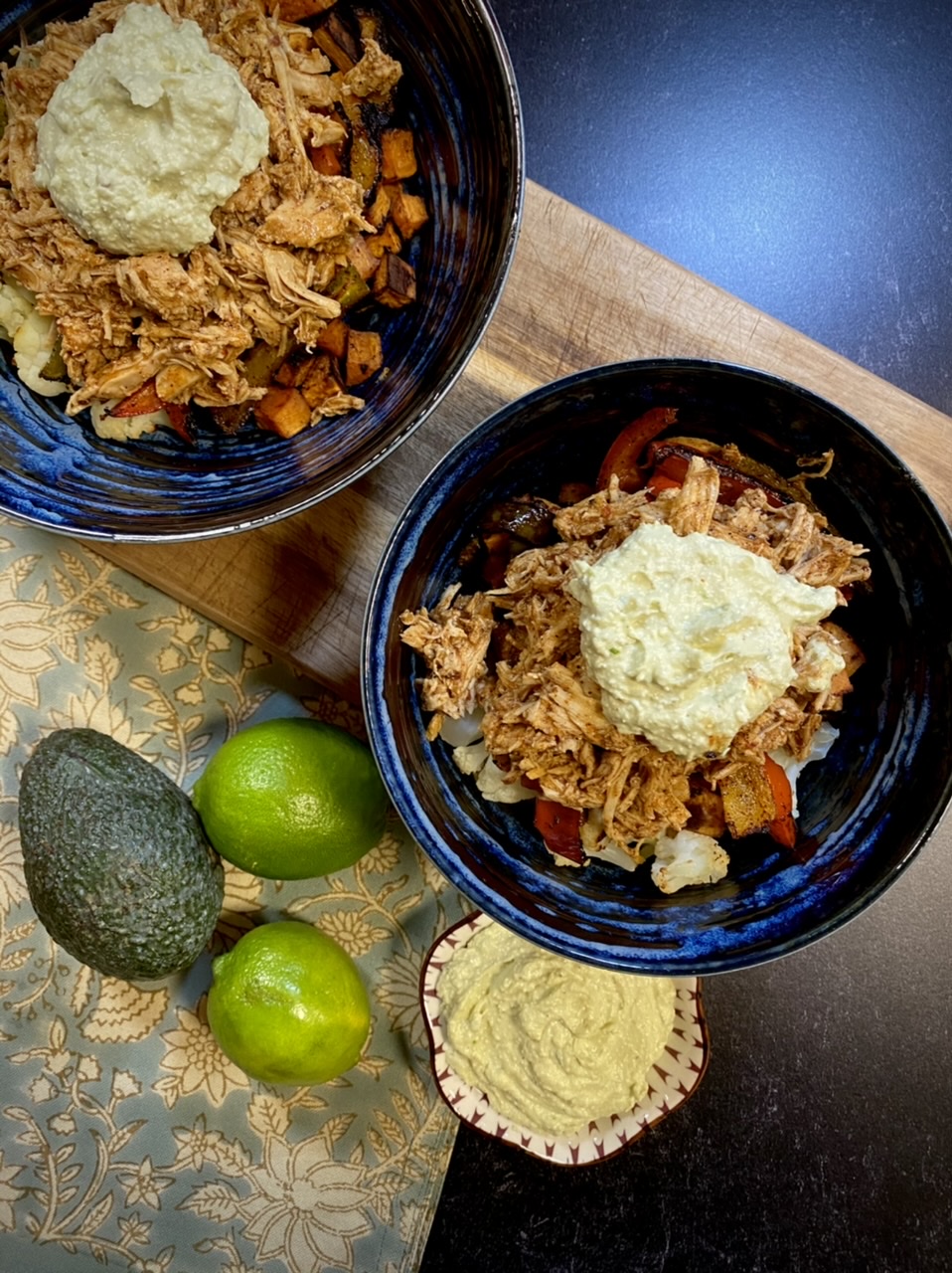 0F5D200D 7E40 4056 8EE0 6C7DE6EA6526 - Healthy Slow Cooker Chicken Enchilada Bowls with Avocado Cotija Dressing