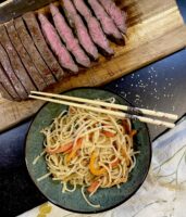 C6AF4650 1F91 4F3C 999E 9A6E5B7A326A 171x200 - Asian Marinated Flatiron Steak with Peanut Noodles