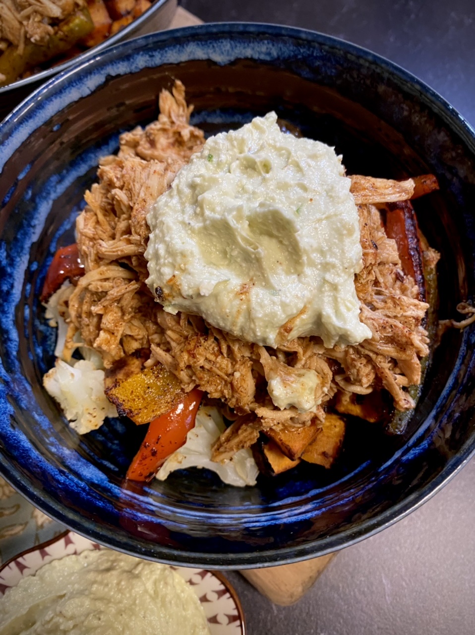 D02A8DE9 DCD0 4821 8629 ECB7219A7994 - Healthy Slow Cooker Chicken Enchilada Bowls with Avocado Cotija Dressing