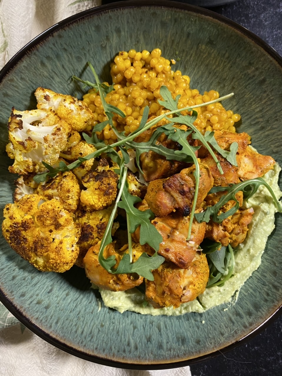 84AFB991 98C5 4BD6 B82A 711DE697070A - Moroccan-Style Chicken “Shawarma” with Golden Cauliflower, Turmeric Pearl Couscous, & Whipped Avocado Feta