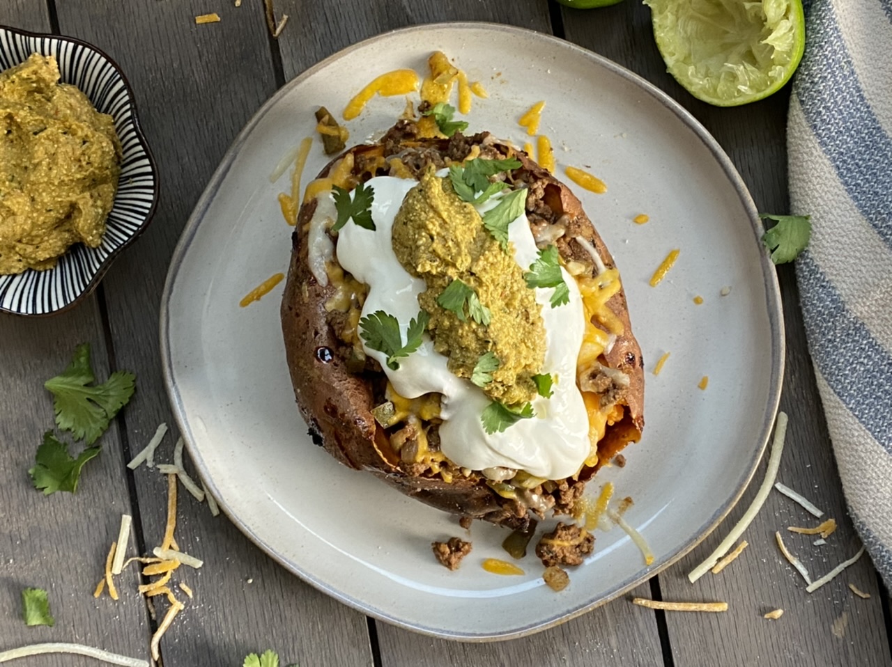 40F2F23B 7700 4AD0 B029 C2F0658AD80D - Taco Stuffed Sweet Potatoes with Spicy Avocado Crema