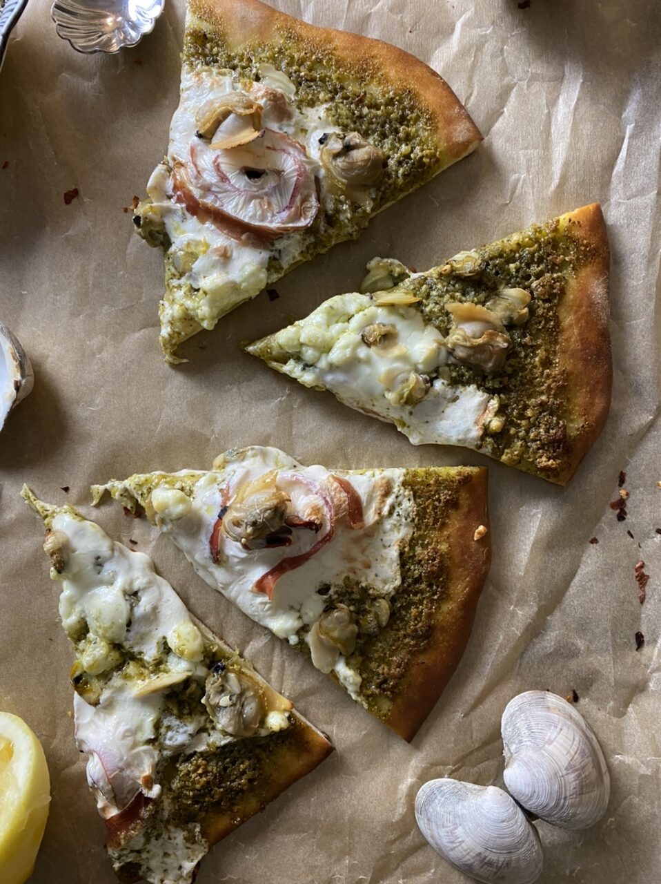 BA9F56E2 7A1C 403D 941B CCB30425EDEC e1617900231391 - Zesty Pesto Clam and Prosciutto Pizza