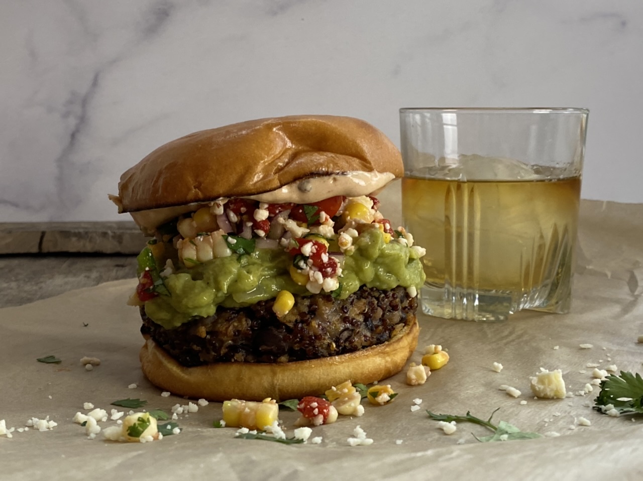 A69F50AE 52B6 4B9B A078 8716E16DE105 - Southwestern Black Bean Quinoa Burger with Guacamole, Corn Salsa, & Chipotle Aioli