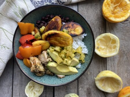 Cuban chicken mojo bowls with fried plantains, peppers, black beans, avocado, and rice