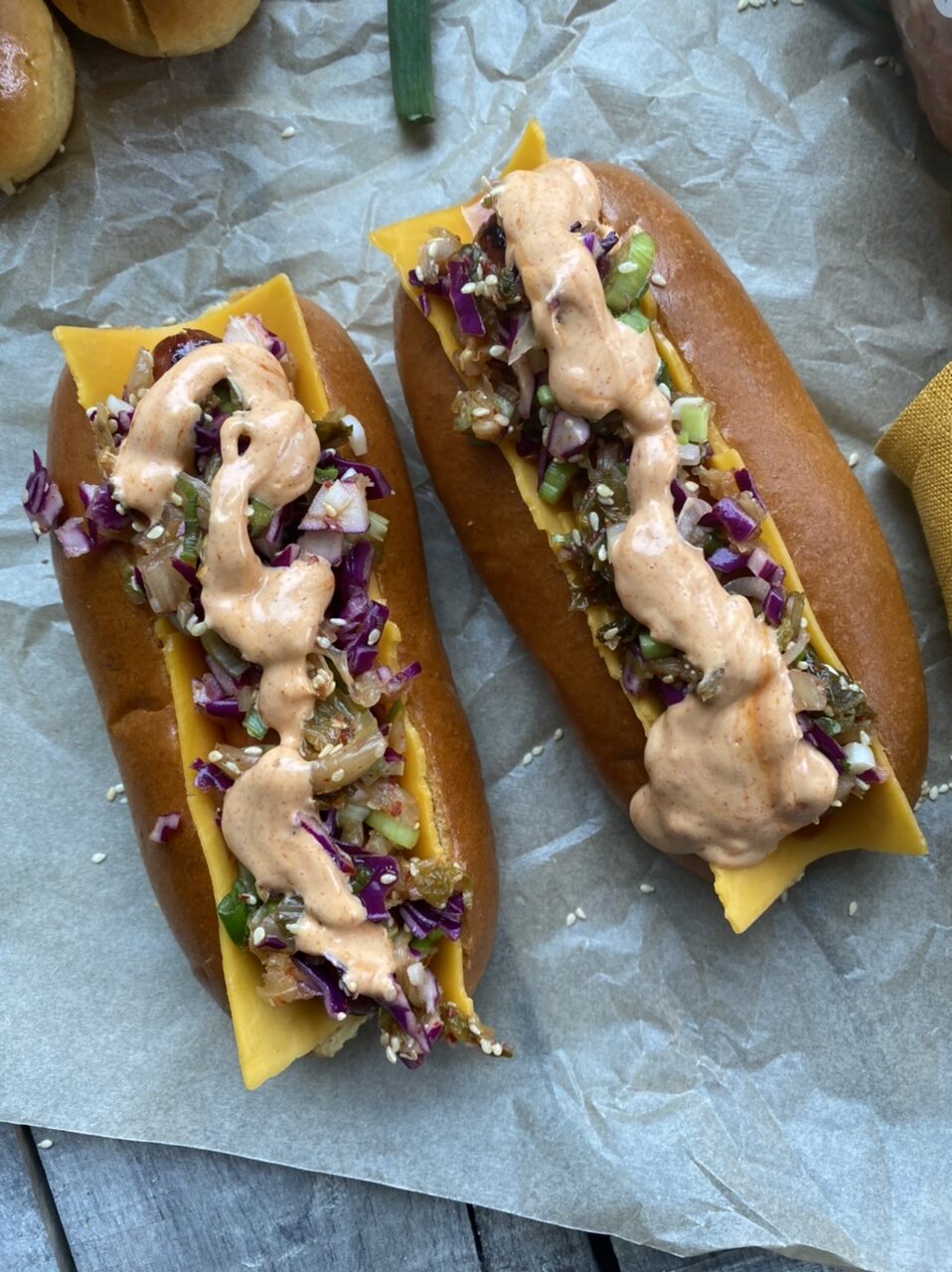 50FFA69F 5284 4095 8523 61DC8C5F3E0C e1623085242264 - Cheesy Korean-Style Hot Dogs with Kimchi Slaw & Gochujang Aioli