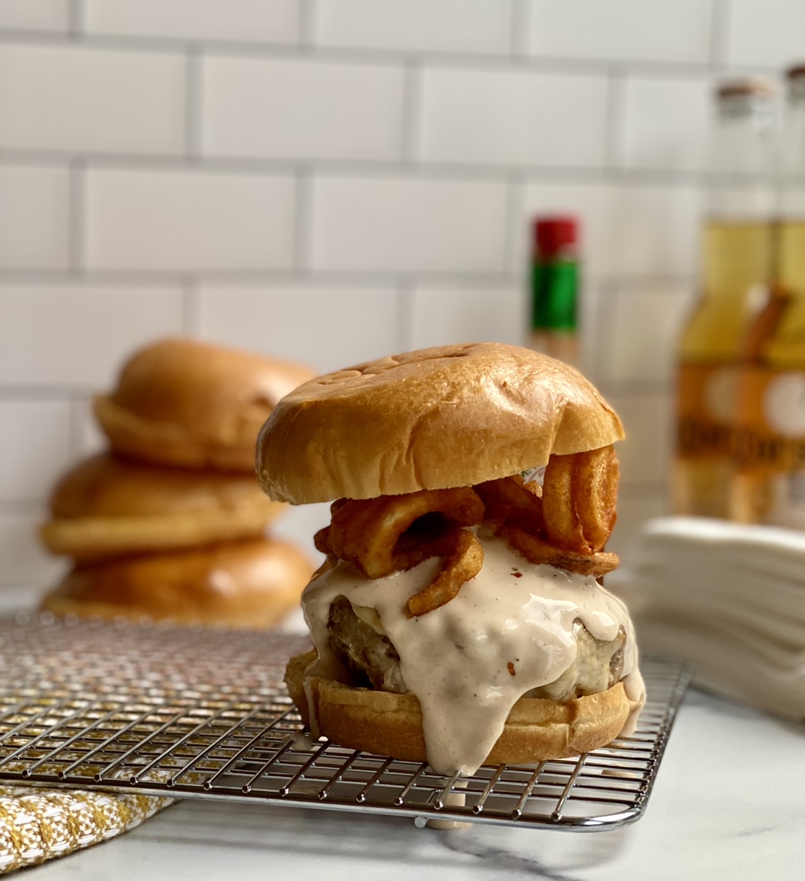 0424DB80 850A 4450 962A 4D661882ABB1 - Cajun Turkey Cheeseburgers topped with Seasoned Curly Fries